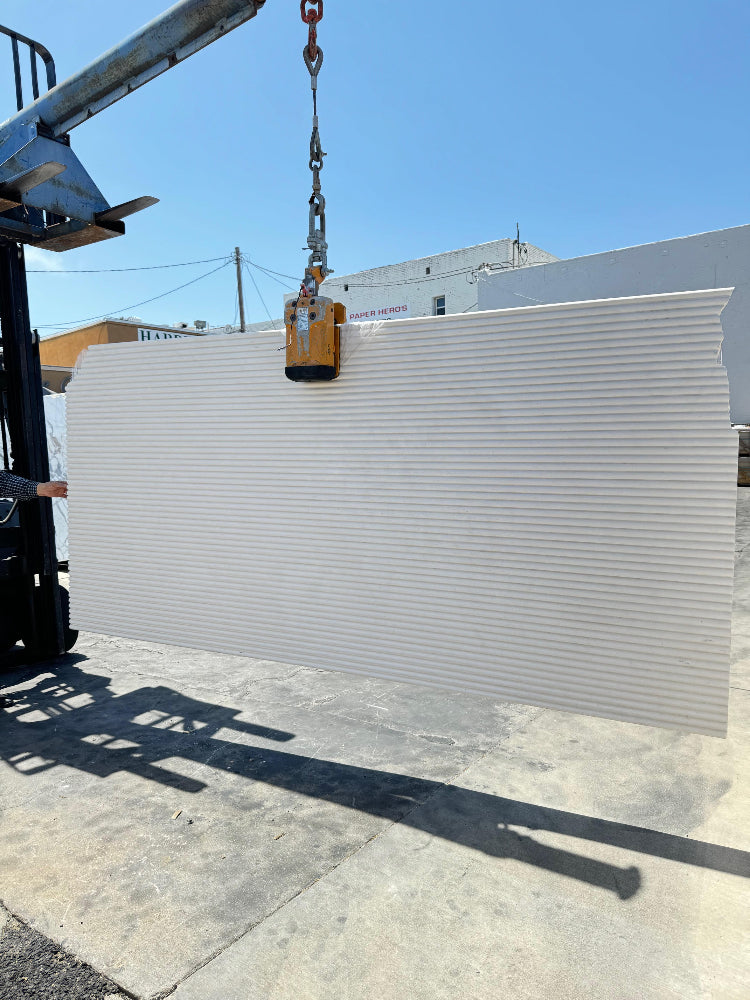 Beige fluted honed limestone slab in stock in Los Angeles slab yard