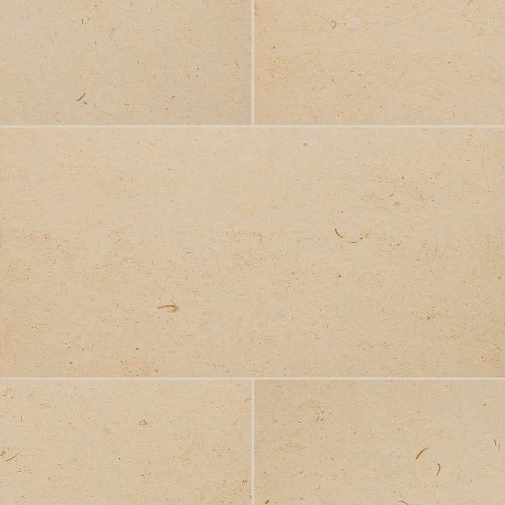 Beige limestone tiles with a subtle pattern