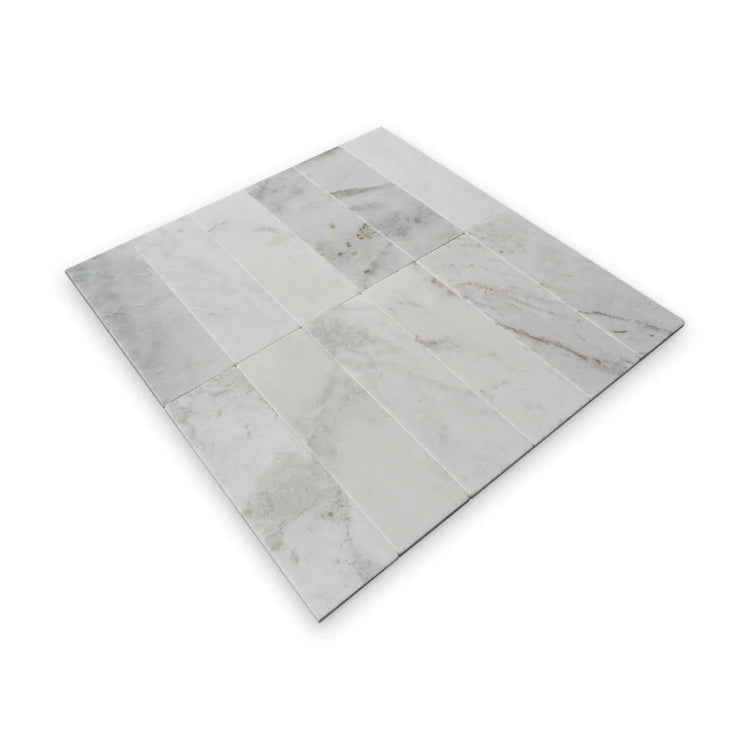 Pietra Collection in Fior di Bianca Tumbled Marble Tile 4" x 12"