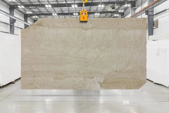 Honed ivory travertine marble slab with creamy vanilla accents available in Los Angeles