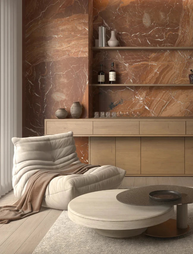 red marble home with beige furniture accents
