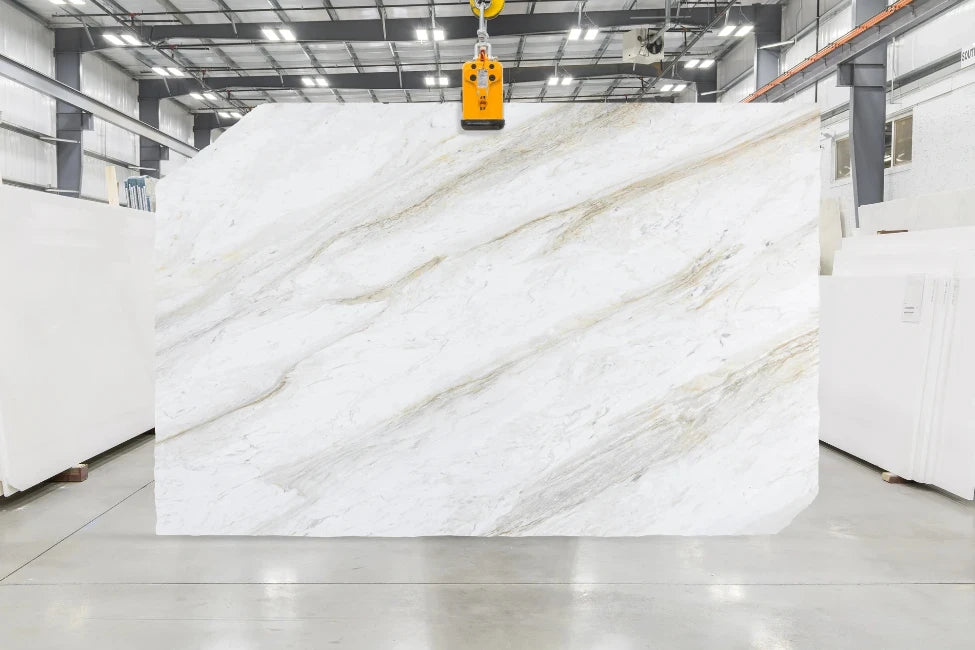Honed Volakas Gold white dolomite slab in slab yard
