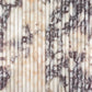 Close-up of marble fluted tile with beige and brown tones