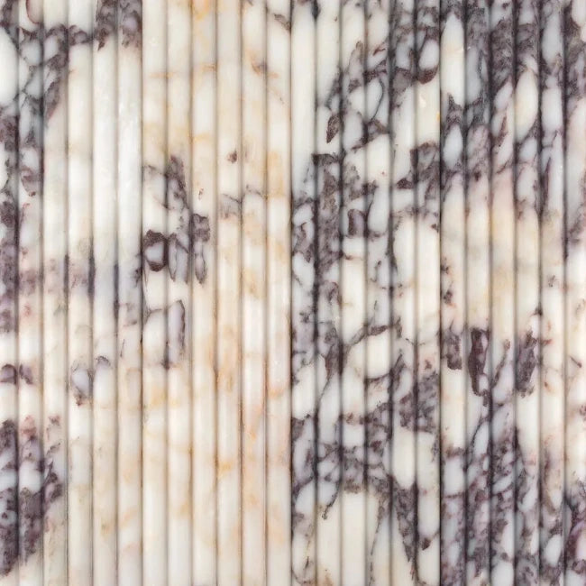Close-up of marble fluted tile with beige and brown tones