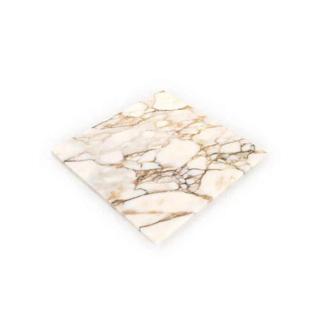 Marble-patterned square tile on a white background