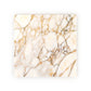 Marble-patterned surface with beige and brown tones on a white background