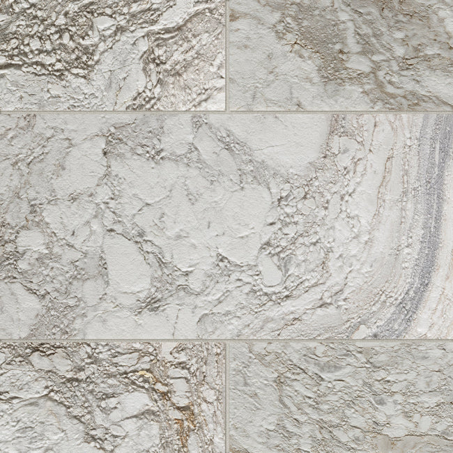 Rectangular marble tiles with a textured, stone finish in warm off-white, beige, and light gray with natural veining.