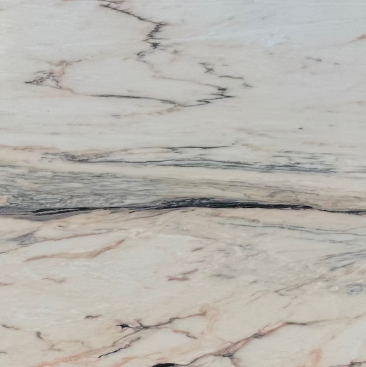 closeup of white and pink marble with grey veining