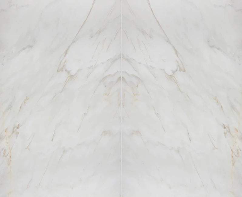 White marble book matched slab with subtle gray veining