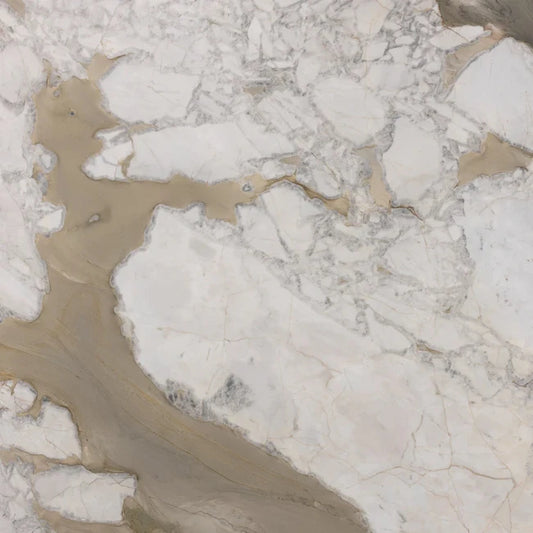 Close-up of white creamy marble with grey and gold veining