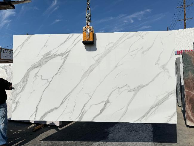 Calacatta Glass slab polished white glass finish with subtle veining, available at Los Angeles slab yard