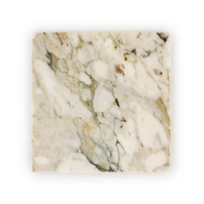 Close-up of marble tile with beige and green veins 