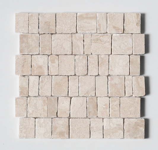A square sample of light beige travertine stone mosaic tiles arranged in a brick pattern, showing natural stone texture and variations.