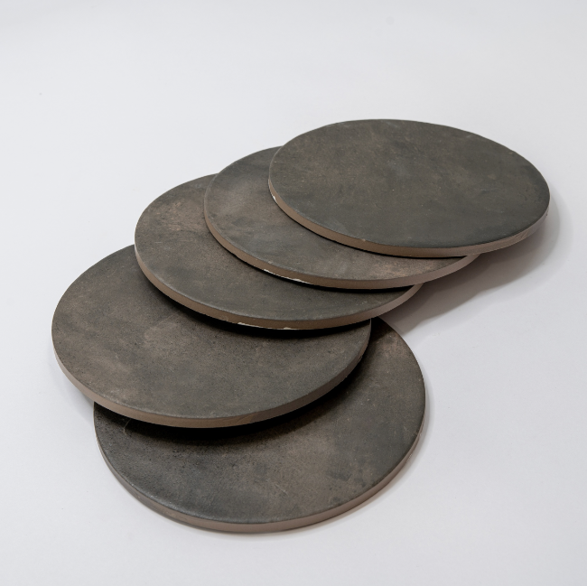 Montara Circle Porcelain Tile in Black Horse