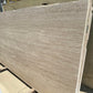 Beige Travertine stone slab in stock in Los Angeles slab yard