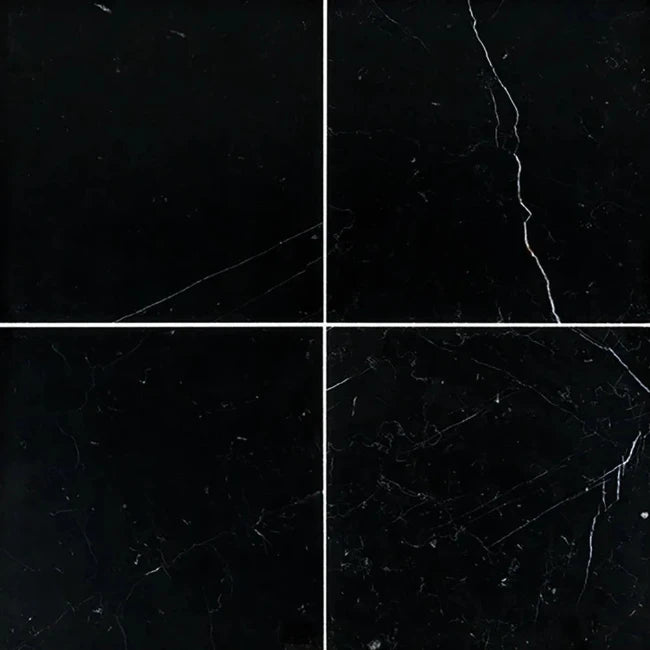 Black marble tiles with white veining