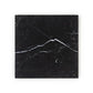 Black marble tile with white veins on a white background