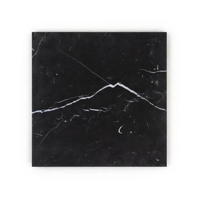 Black marble tile with white veins on a white background