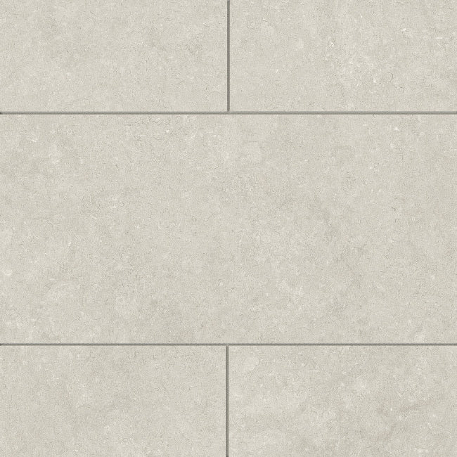 Gray tiles with a subtle pattern on a gray background
