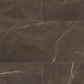 Brown marble tiles with visible veins and texture