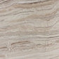 Close-up of beige and brown marble-like travertine slab