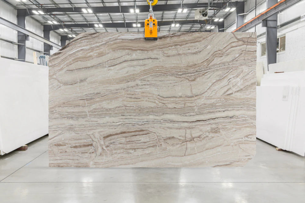 Large slab of beige travertine with veining in Los Angeles slab yard