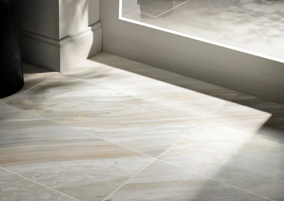 Close-up of a tiled floor with a neutral color palette