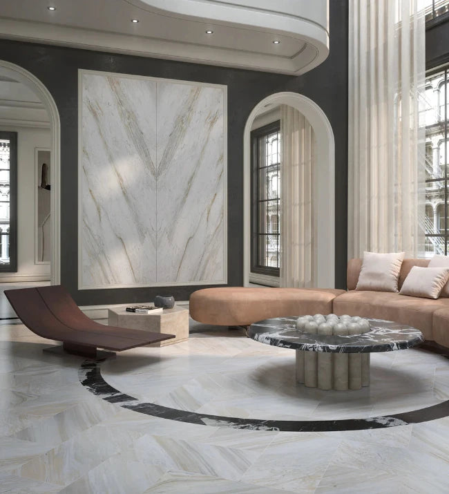 Modern living room with marble floors,  furniture, and decor.