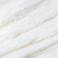Honed Volakas Gold white dolomite slab with diagonal gold, grey, and light brown veins